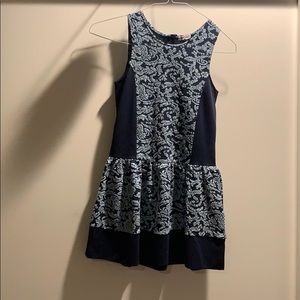 Cute blue kids dress with teal stitching